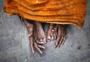 The mother of Phoolbai, who died after she underwent a sterilization surgery at a government mass sterilisation "camp", reacts at her home in Aamsena village in Bilaspur district